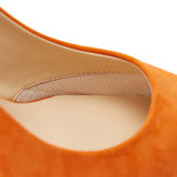 Orange suede high heels